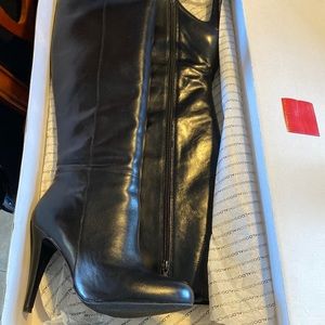 ALDO knee length heel boots.